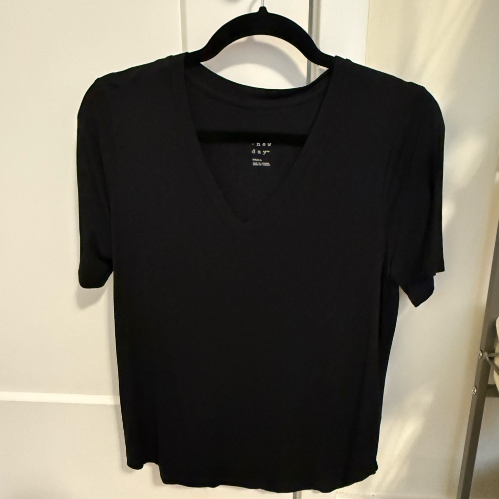 A New Day, plain black top size small, worn once